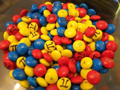 Candy with the word pi written in english and using the greek symbol.